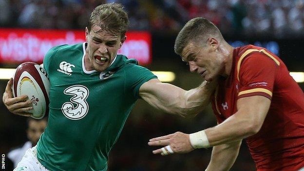 Andrew Trimble tries to fend off Scott Williams at the Millennium Stadium