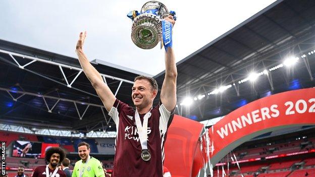 .Jonny Evans lifts the FA Cup