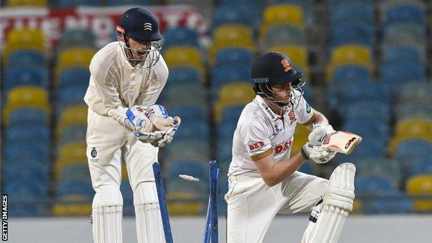 Essex batsman Callum Taylor is bowled by Dom Bess