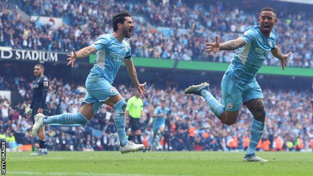 Man City celebrate their third goal