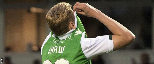 Hibs' Oli Shaw is disappointed after missing a crucial penalty