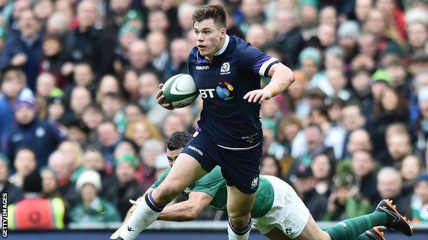 Centre Huw Jones makes a break for Scotland against Ireland