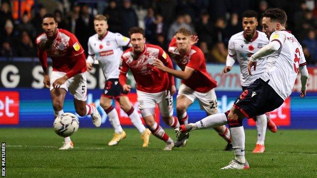 Josh Sheehan scores a penalty