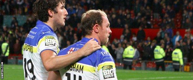 Stefan Ratchford consoles team-mate Micky Higham after Warrington's 2012 Grand Final defeat