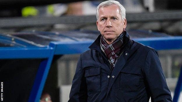 Alan Pardew looks on from the touchline while in charge of Den Haag