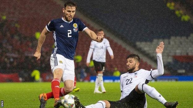 Stephen O'Donnell playing for Scotland against Albania