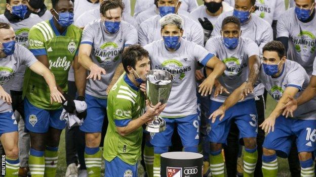 Seattle Sounders lift the MLS Western Conference Finals trophy