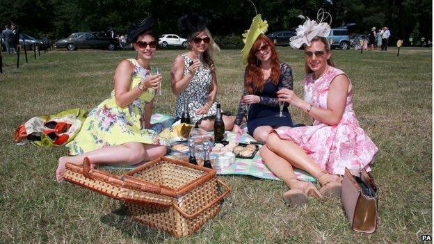 Racegoers enjoy a picnic in the car park during Ladies Day, on day three of the 2015 Royal Ascot Meeting at Ascot Racecourse, Berkshire