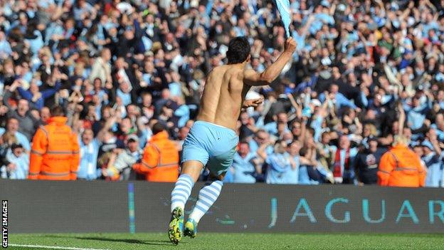 Sergio Aguero celebrates after scoring against QPR