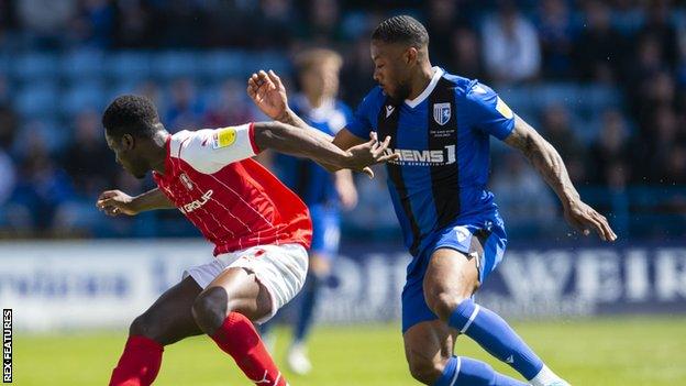 Ryan Jackson (right) is one of nine players leaving Gillingham