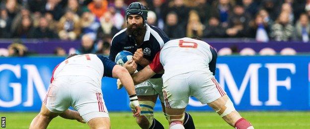 Josh Strauss carries for Scotland against France