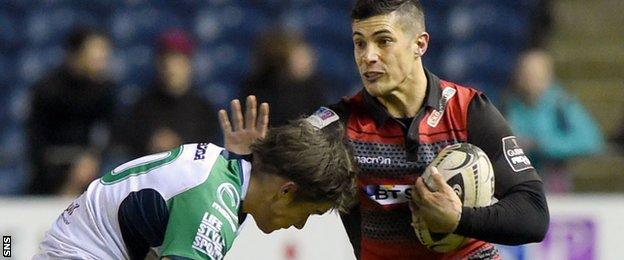 Connacht's Aj MacGinty tackles Edinburgh's Phil Burleigh