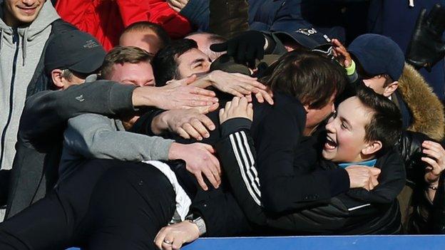 Chelsea manager Antonio Conte celebrates with fans