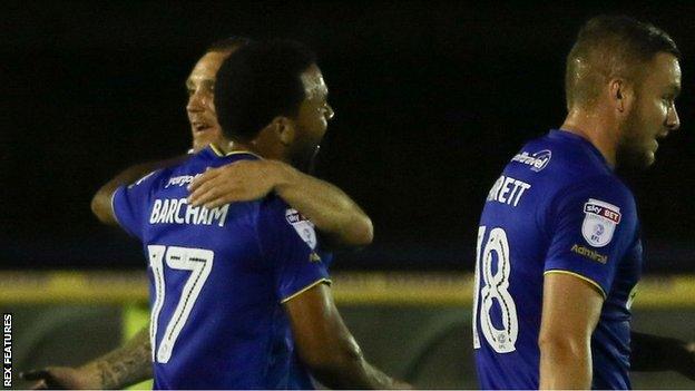 Andy Barcham celebrates his goal for Wimbledon