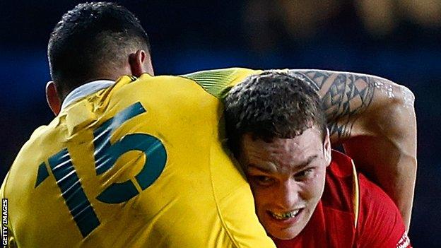 Australia's Israel Folau halts George North at the 2015 World Cup