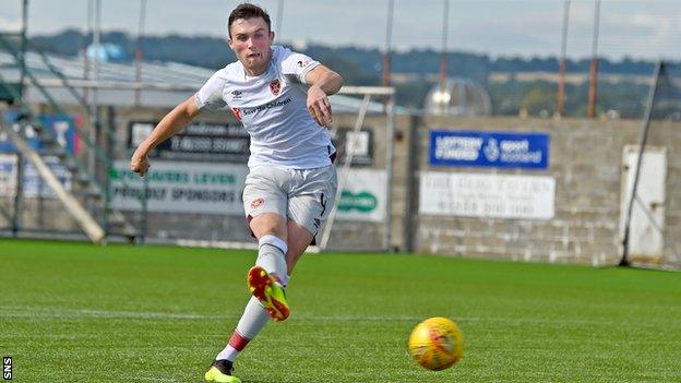 John Souttar scores the decisive penalty for Heart of Midlothian against Raith Rovers