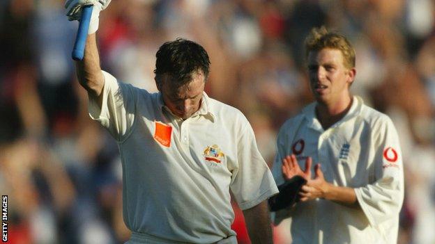 Steve Waugh raises his bat for his century