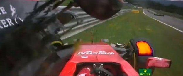 Kimi Raikkonen crashes into Alonso