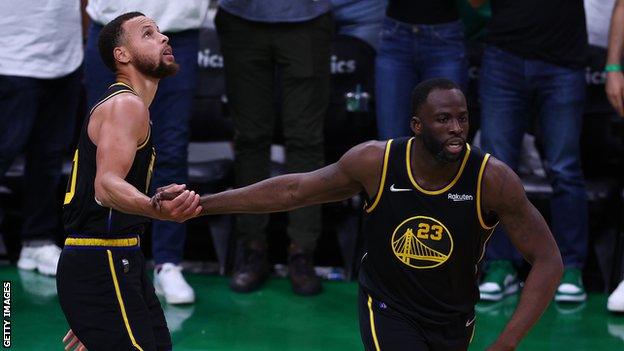 Draymond Green and Steph Curry of Golden State Warriors