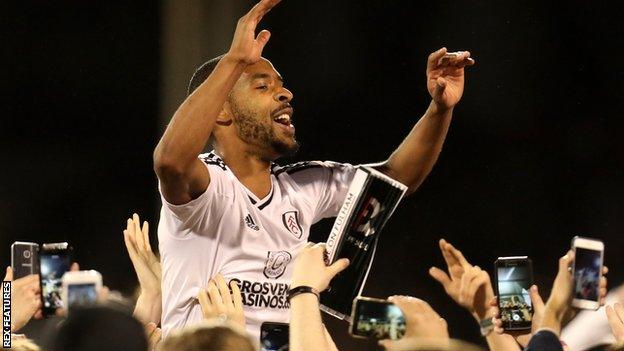 Denis Odoi celebrates with Fulham fans after their play-off semi-final victory over Derby County