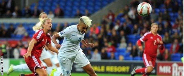 Lianne Sanderson scores for England against Wales