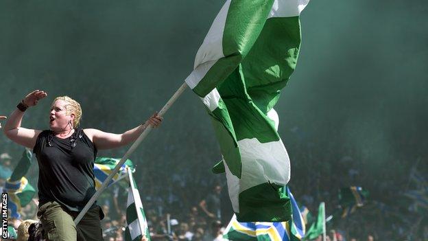 A member of the 'Timbers Army' celebrates after Portland score during the second half of the game the Seattle Sounders FC at Jeld-Wen Field on September 15, 2012