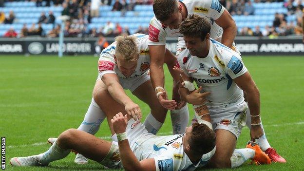 Exeter celebrate Henry Slade's second try