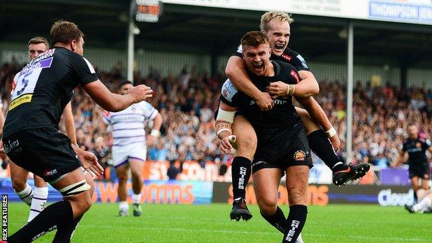 Exeter celebrate their fourth try