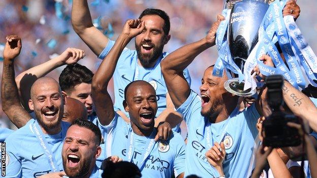 Manchester City lift the Premier League trophy in 2018