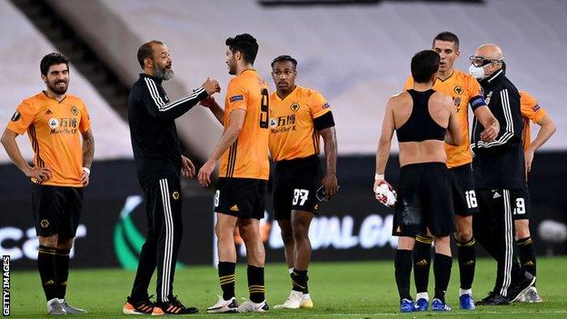 Wolves players celebrate beating Olympiakos