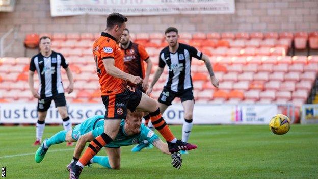 Dundee United's Lawrence Shankland scores