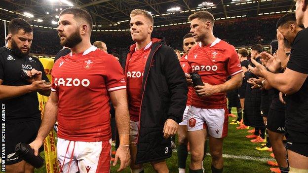 Gareth Anscombe (centre) and Rhys Priestland (right) both played their first internationals under Wayne Pivac against New Zealand