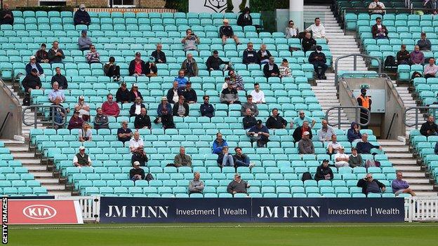 Socially-distanced cricket fans watch Surrey take on Middlesex at The Oval - how football stadiums could look next season