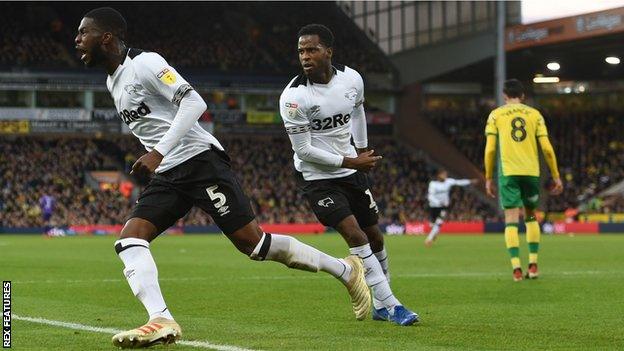 Fikayo Tomori (right) celebrates his first-half goal against Norwich