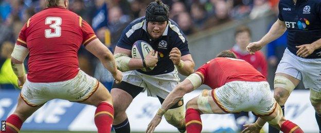 Zander Fagerson carries for Scotland against Wales