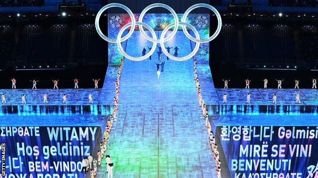 Athletes entering the Bird's Nest stadium