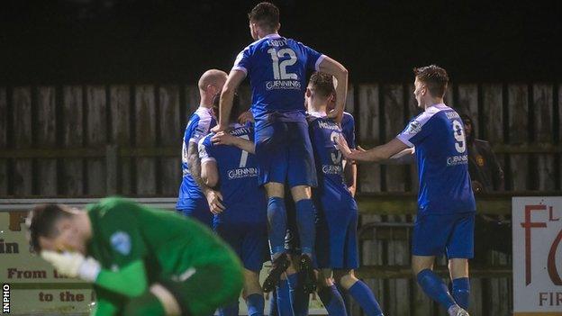 Agony for Carrick keeper Harry Doherty as the Mallards celebrate their second goal