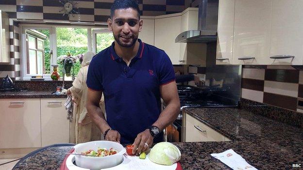 Amir Khan in his kitchen