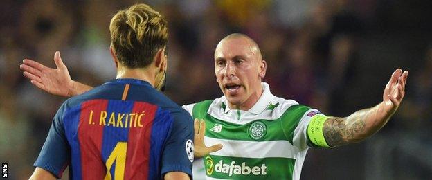 Celtic captain Scott Brown remonstrates to Barcelona's Ivan Rakitic