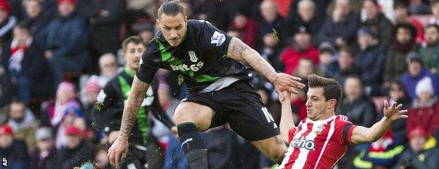 Marko Arnautovic gets a shot away under pressure from Cedric Soares