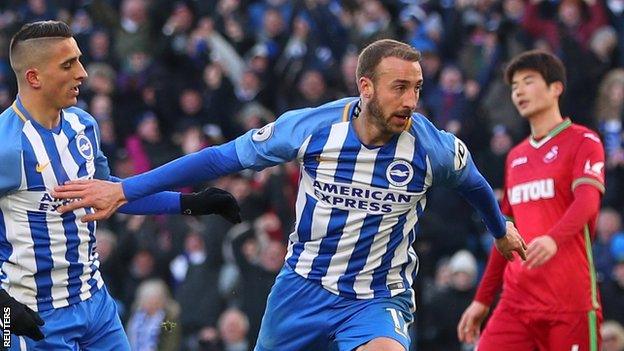 Glenn Murray celebrates one of his two goals for Brighton