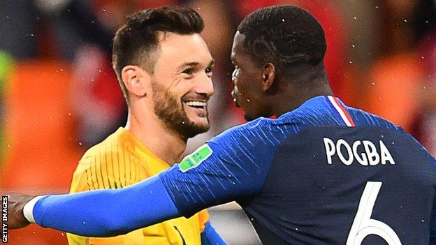 Hugo Lloris embraces Paul Pogba