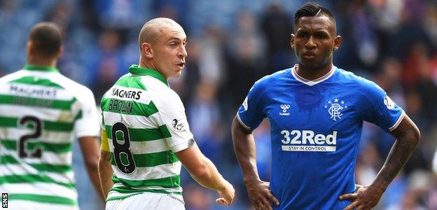 Celtic captain Scott Brown has a word with Rangers' Alfredo Morelos