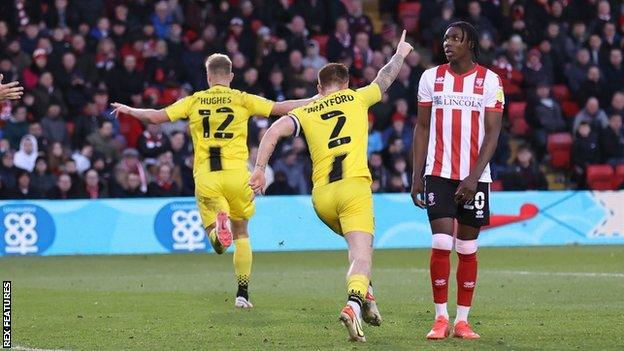 Sam Hughes scored Burton's late winner in Saturday's 2-1 win at Lincoln