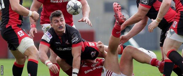 Damien Hoyland is brought down for Edinburgh against Munster