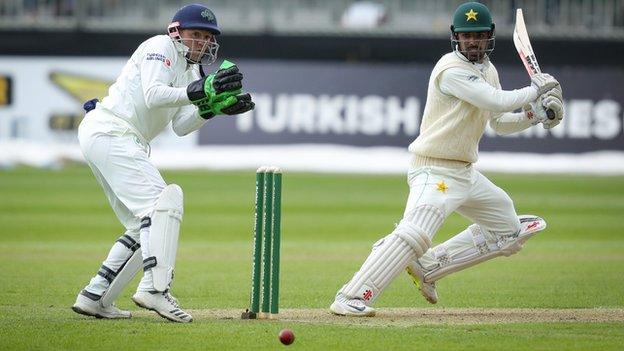 Pakistan batsman Shadab Khan hits a crisp shot on his way to an unbeaten 52 at the close