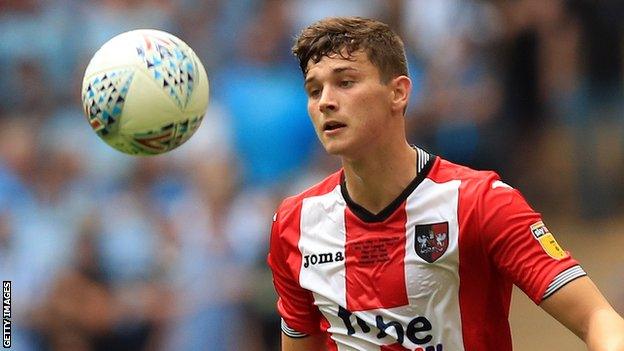 Jordan Storey in action for Exeter City