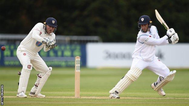 Wayne Madsen (right) plays a shot for Derbyshire