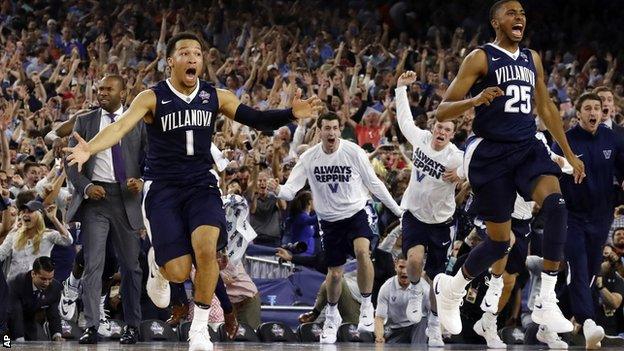 Wildcats players Jalen Brunson (1) and Mikal Bridges (25) celebrate