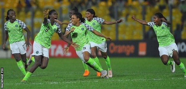 Nigeria celebrate after winning the 2018 Wafcon final shoot-out against South Africa